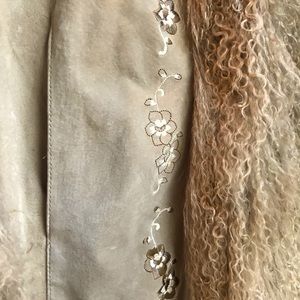 Knee length, suede and lambs wool lined coat